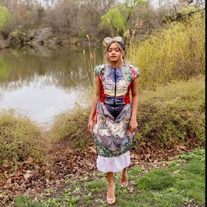 Patchwork dress of remnants and novelty fabrics inspired by subway mosaic tiles.